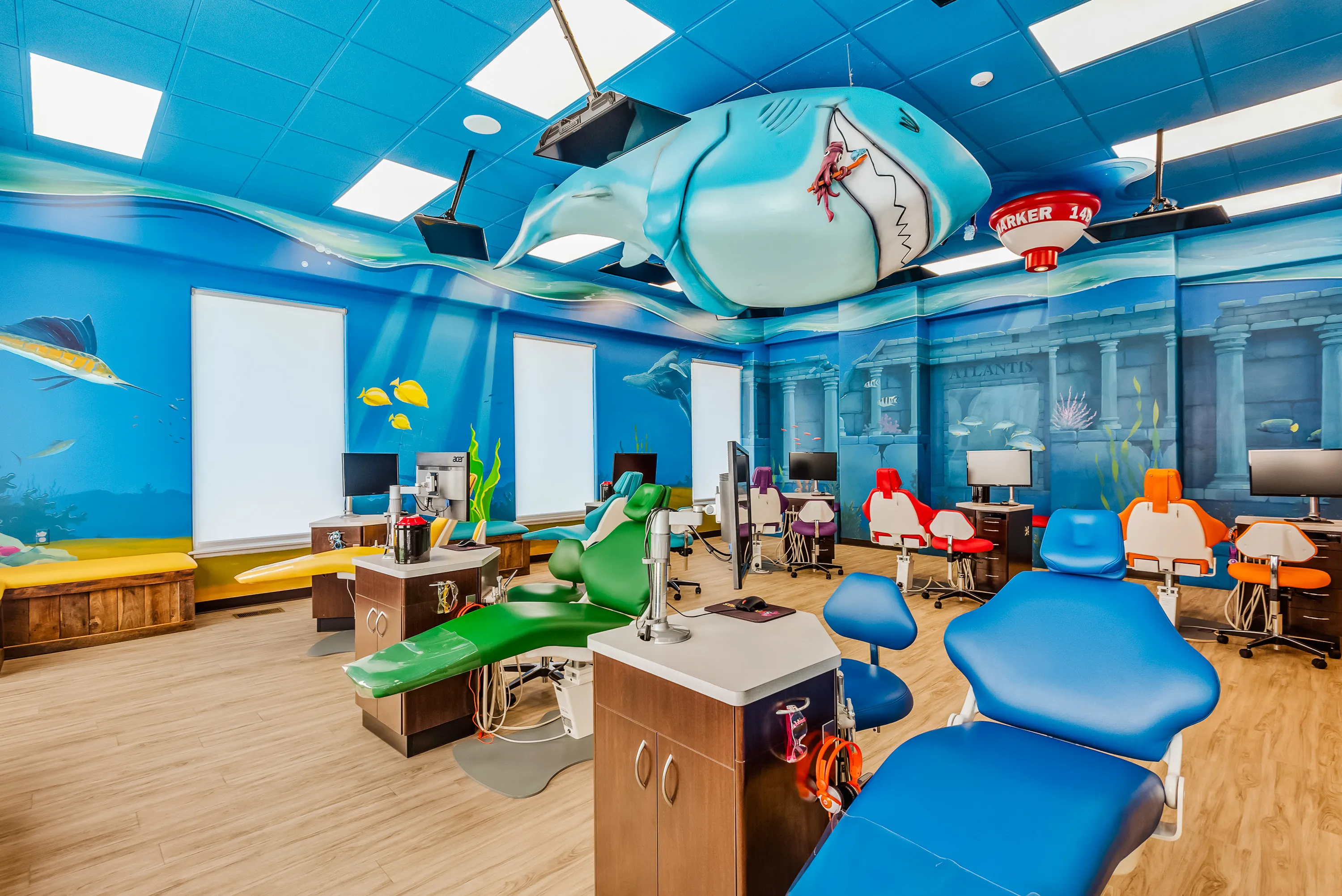 The open bay treatment chairs at Super Smiles